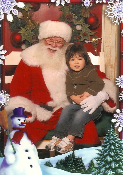 Sitting on Santa's lap Photo