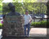Bruce standing in front of a statue of Hans Christen Andersen